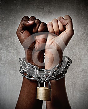 White race hand chain locked together with black ethnicity woman multiracial understanding