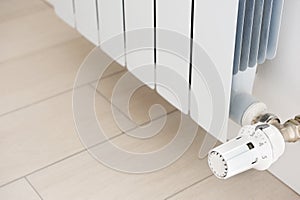 White radiator in an apartment. Radiator