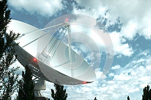 White Radio Telescope, a large satellite dish on a background of blue sky, radar. Technology concept, search for extraterrestrial