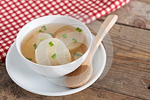 White radish soup in white bowl.