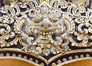 White Rahu statue on wall Thai temple