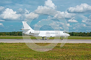 White reactive private jet, taxi to take off