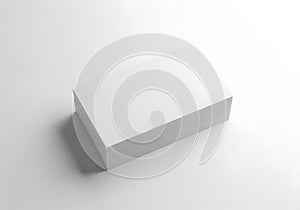 A white rectangular block with a textured side