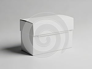 A white rectangular box with a hinged lid on a plain gray background