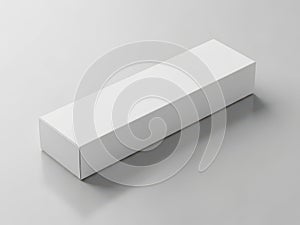 A white rectangular box on a plain gray surface with subtle shadow