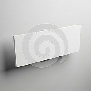 A white rectangular object on a gray background