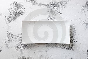 White rectangular Plate on abstract white wooden background