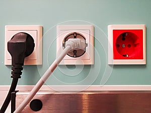 White and red electrical outlets photo