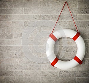 White and red lifebuoy at background