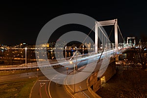 White and red light trails of cars on Elisabeth bridge over Danube at night Budapest Hungary Europe