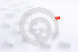 White and red medicine antibiotic pills