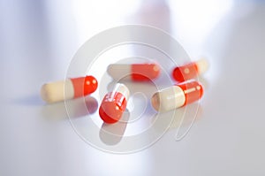 White and red medicine antibiotic pills