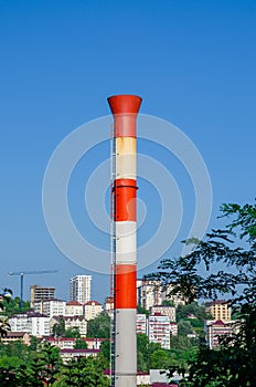 White-red metal pipe of the boiler chimney