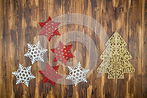 white and red shiny snowflakes decoration on wood, Christmas tree