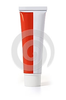 White with red tube of ointment on a white background. Front view. Full depth of field.