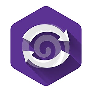 White Refresh icon isolated with long shadow. Reload symbol. Rotation arrows in a circle sign. Purple hexagon button