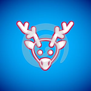 White Reindeer icon isolated on blue background. Merry Christmas and Happy New Year. Vector