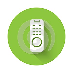 White Remote control icon isolated with long shadow background. Green circle button. Vector