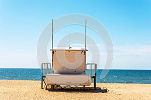 White rescue hut on a sandy beach, safe relax by the ocean, a be