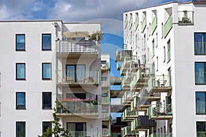 White residential building with many balconies photo