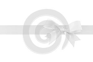 White ribbon with bow isolated on white background