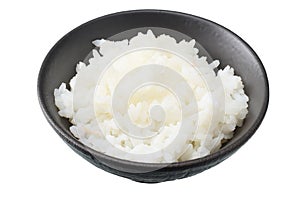 White rice in black bowl isolated on white background