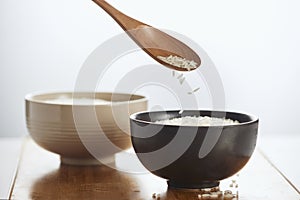 White rice in bowl on table. Concept asian food