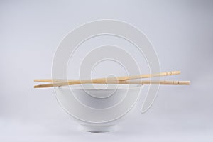 White Rice Bowl with Wooden Chopsticks