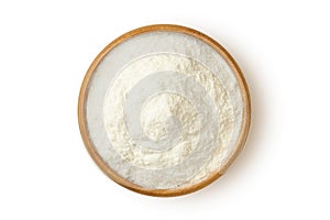 White rice flour in wooden bowl on white background