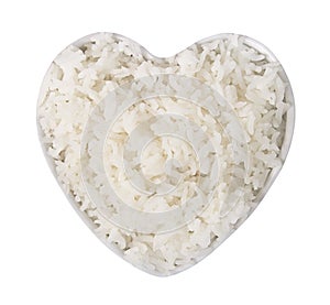 White rice heart shape isolated on white