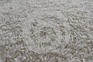 white rice, natural long rice grain for background and texture