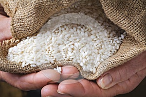 White rice in old hand
