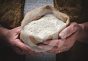 White rice in old hand