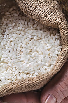 White rice in old hand