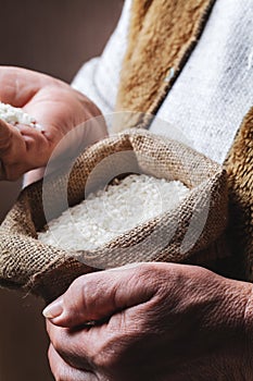 White rice in old hand