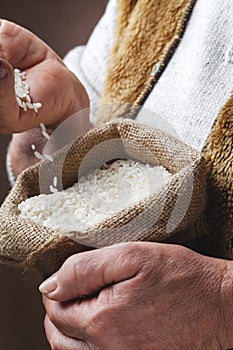 White rice in old hand