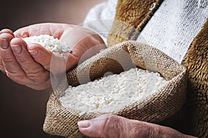 White rice in old hand