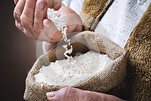 White rice in old hand