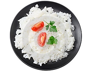 White rice with tomato in black bowl isolated on white background. top view