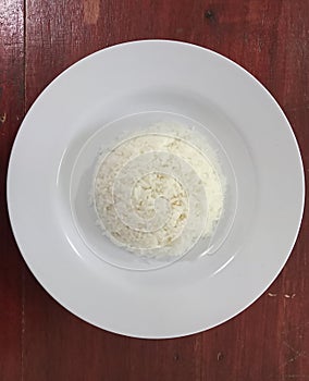 White rice on a white porcelain plate