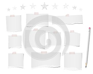 White ripped blank note, notebook paper strips, sheets for text or message stuck with sticky tape on white background