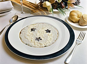 White risotto with chocolate starlets