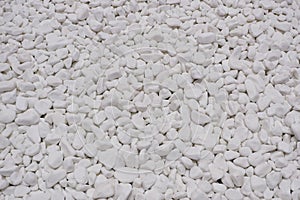 white river grit stones background. White marble gravel. Crushed stone texture