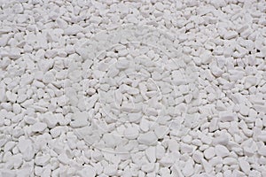 white river grit stones background. White marble gravel. Crushed stone texture