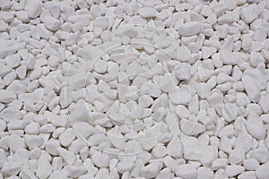 white river grit stones background. White marble gravel. Crushed stone texture