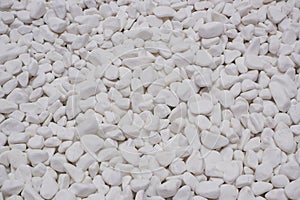 white river grit stones background. White marble gravel. Crushed stone texture