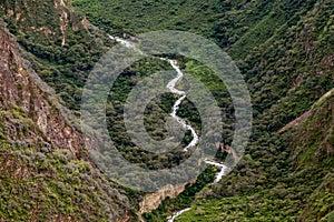 White river or Rio Blanco Valley with fast running water between the stones, Peru photo