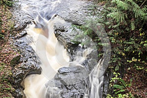 White River Water Flowing Over Rocky Waterfall in Pacific Northwest