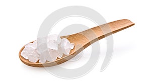 White rock sugar in wood spoon islated on white