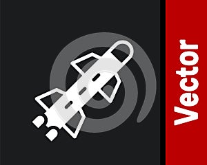 White Rocket icon isolated on black background. Vector